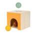 Boule en bois glissée dans le trou de la boîte Montessori Small Foot